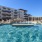 Resort-style swimming pool with lounge seating