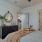 Bedroom facing living room and spacious closet